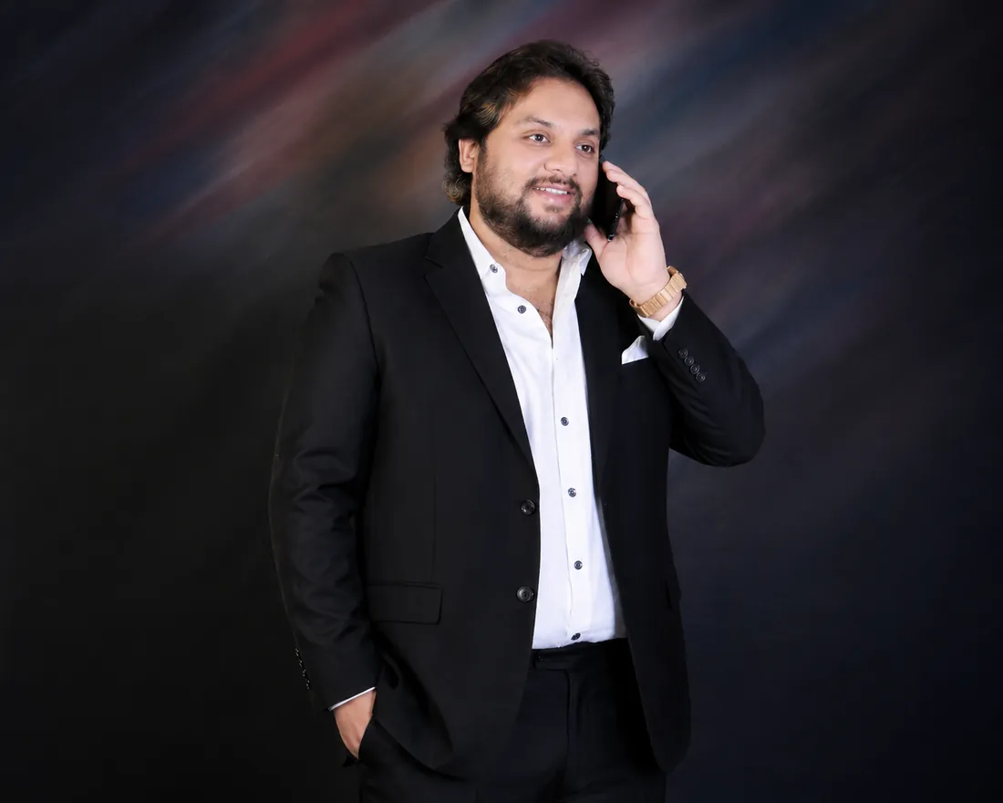 Mohammed Ameenuddin, Founder and Chairman of Arsh Group, in a dark suit.